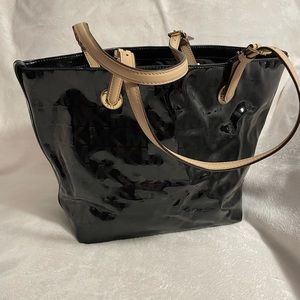 Black Michale Kors patent leather shoulder bag.